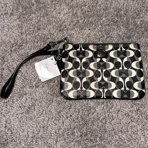 Brand new Coach wristlet
